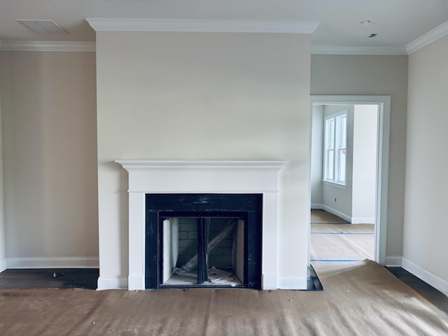 420 Carolina Cherry Ct Unit 102, Charleston, SC 29414 - detailed view of wood finished floors, crown molding, baseboards, and a fireplace
