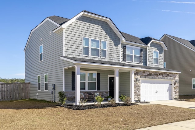 craftsman house featuring a garage and a porch