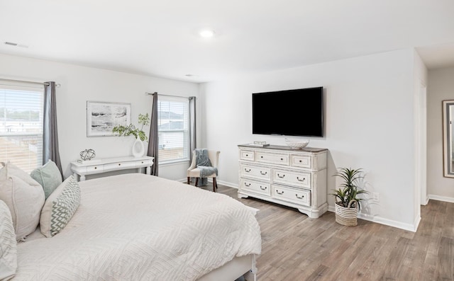 bedroom featuring light hardwood / wood-style flooring