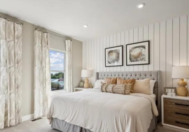 carpeted bedroom with baseboards and recessed lighting