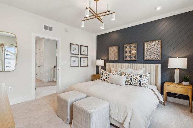carpeted bedroom featuring a chandelier, baseboards, and recessed lighting