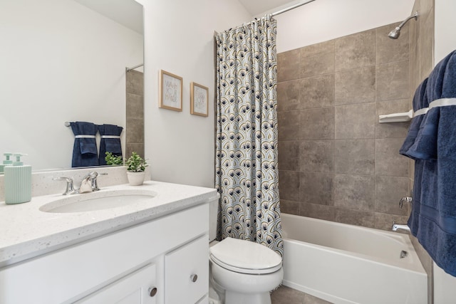 bathroom featuring shower / bath combo with shower curtain, toilet, and vanity