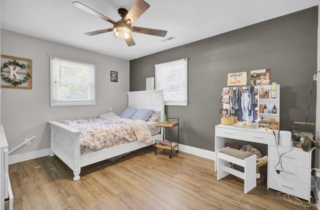1861 Jaywood Cir, Charleston, SC 29407 - bedroom with baseboards, a ceiling fan, wood finished floors, and visible vents