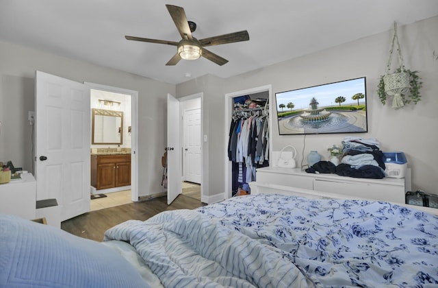 1861 Jaywood Cir, Charleston, SC 29407 - bedroom featuring ceiling fan, a closet, wood finished floors, and ensuite bathroom
