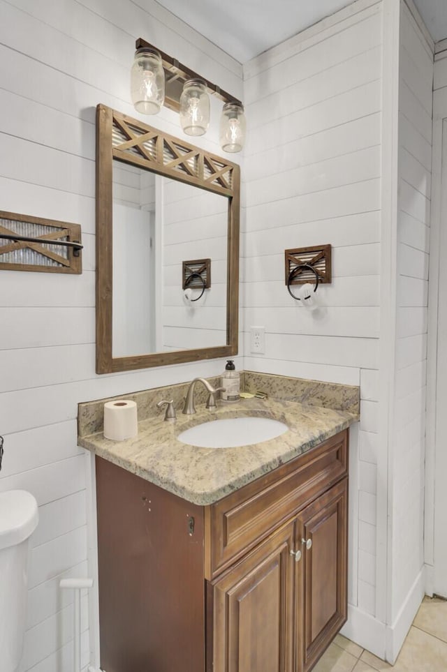 1861 Jaywood Cir, Charleston, SC 29407 - half bath with tile patterned flooring, wood walls, toilet, and vanity