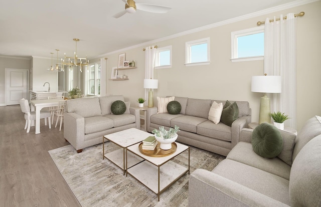living room with ornamental molding, wood finished floors, and ceiling fan with notable chandelier