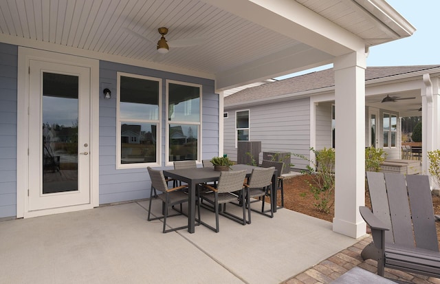 view of patio / terrace featuring outdoor dining space and a ceiling fan