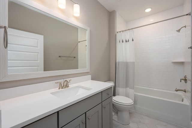 full bathroom featuring toilet, tile patterned floors, recessed lighting, vanity, and shower / tub combo