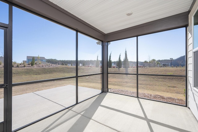 unfurnished sunroom with a healthy amount of sunlight