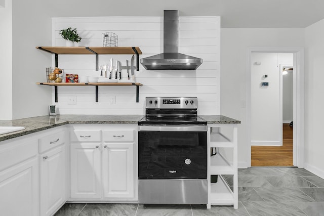 1909 Swift Ave, Charleston, SC 29407 - kitchen featuring electric range, wall chimney range hood, open shelves, white cabinetry, and stone countertops