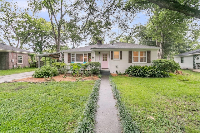 1909 Swift Ave, Charleston, SC 29407 - single story home featuring a front lawn, an attached carport, driveway, a chimney, and a shingled roof