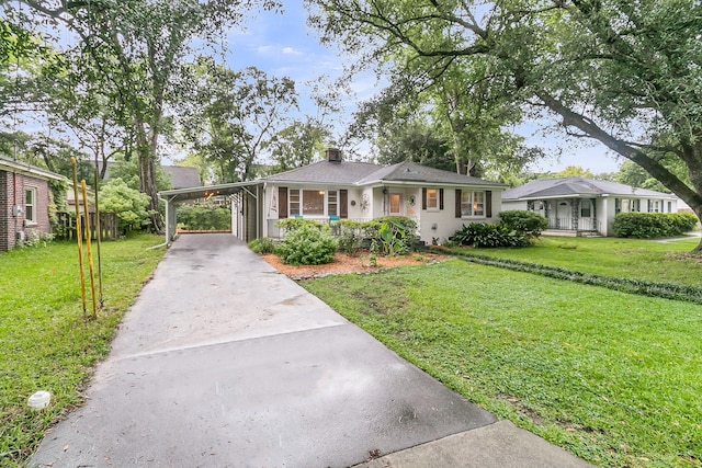 1909 Swift Ave, Charleston, SC 29407 - view of front of property featuring covered porch, driveway, a front yard, a chimney, and a carport