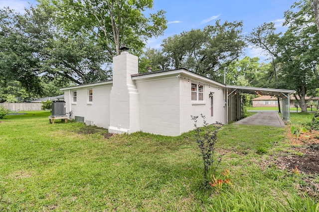 1909 Swift Ave, Charleston, SC 29407 - view of side of property with a chimney and a central air condition unit
