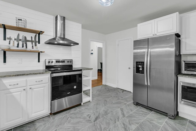 1909 Swift Ave, Charleston, SC 29407 - kitchen with open shelves, appliances with stainless steel finishes, wall chimney exhaust hood, and white cabinetry