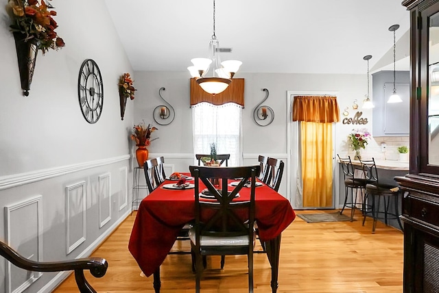8692 Bentwood Dr, North Charleston, SC 29406 - dining area with light wood finished floors