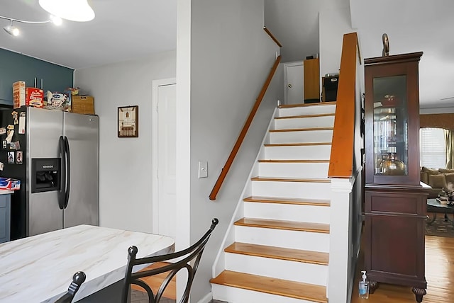 8692 Bentwood Dr, North Charleston, SC 29406 - stairs featuring wood finished floors