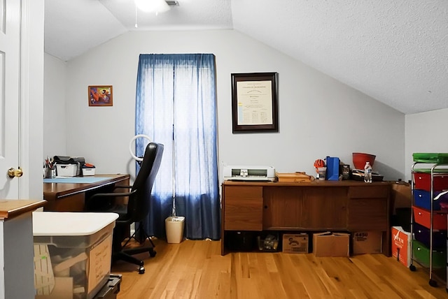 8692 Bentwood Dr, North Charleston, SC 29406 - office featuring wood finished floors, vaulted ceiling, and a textured ceiling