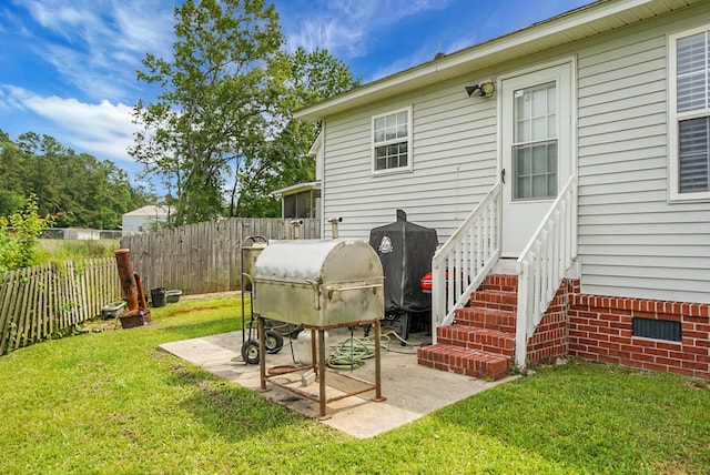 8692 Bentwood Dr, North Charleston, SC 29406 - fenced backyard with a patio area
