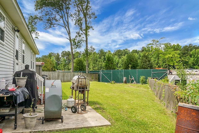 8692 Bentwood Dr, North Charleston, SC 29406 - fenced backyard with a patio