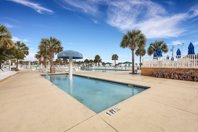 view of swimming pool featuring a patio