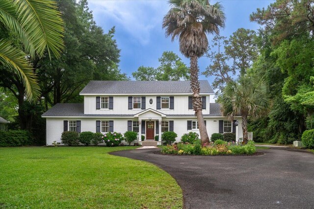 375 Seewee Cir, Mount Pleasant, SC 29464 - view of front of house featuring driveway, a front lawn, and a shingled roof