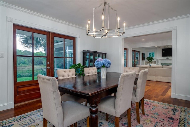 375 Seewee Cir, Mount Pleasant, SC 29464 - dining area featuring a chandelier, wood finished floors, crown molding, and french doors