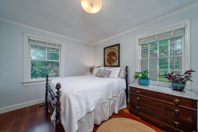 375 Seewee Cir, Mount Pleasant, SC 29464 - bedroom featuring crown molding, dark wood-style flooring, and baseboards