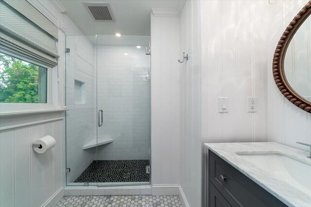 375 Seewee Cir, Mount Pleasant, SC 29464 - bathroom with vanity, a shower stall, tile patterned flooring, and baseboards