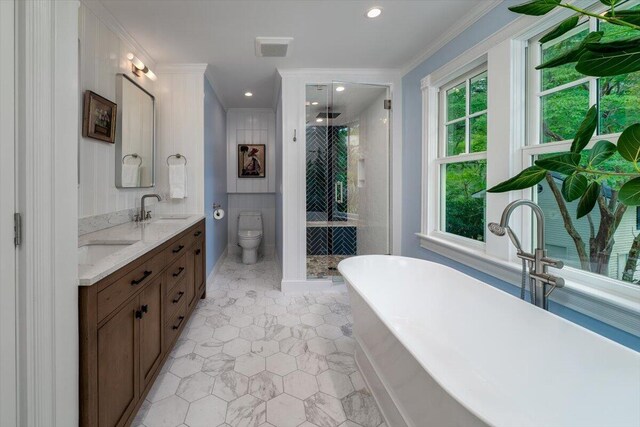375 Seewee Cir, Mount Pleasant, SC 29464 - full bath featuring plenty of natural light, crown molding, a stall shower, a freestanding tub, and double vanity