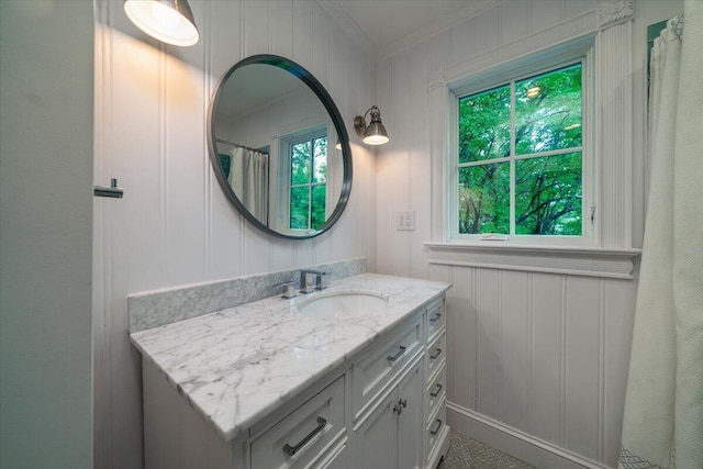 375 Seewee Cir, Mount Pleasant, SC 29464 - bathroom with vanity, crown molding, a decorative wall, and curtained shower
