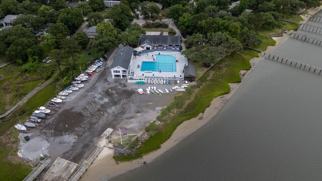 375 Seewee Cir, Mount Pleasant, SC 29464 - bird's eye view of a pool area, a nearby body of water, and a tree filled landscape