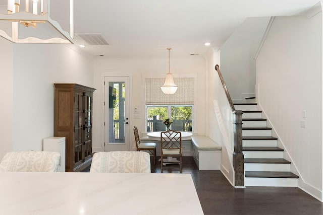 dining space with recessed lighting, baseboards, visible vents, dark wood-style floors, and stairway