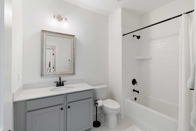 bathroom with vanity, shower / bath combo with shower curtain, and toilet