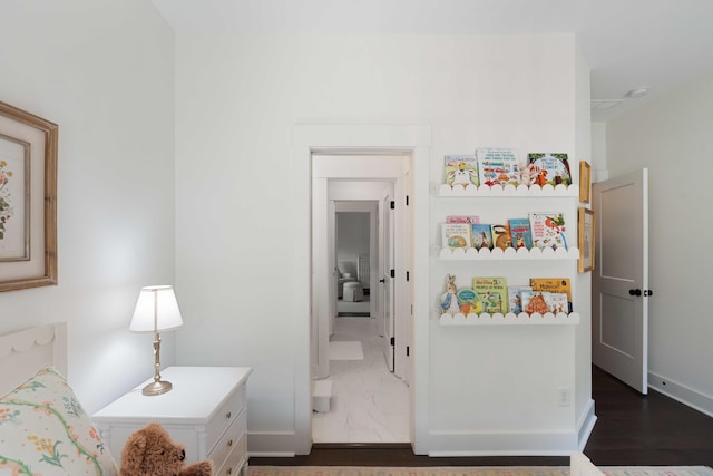 bedroom featuring baseboards