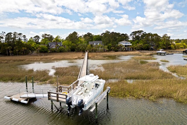 dock area featuring a water view and boat lift