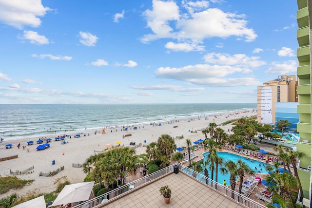 property view of water featuring a beach view