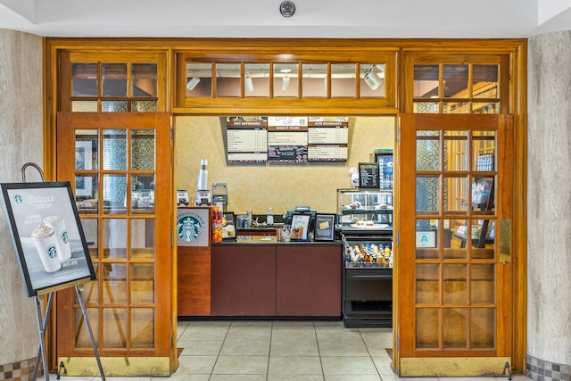 interior space with light tile patterned floors