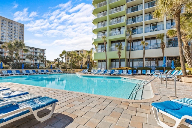 view of pool featuring a patio