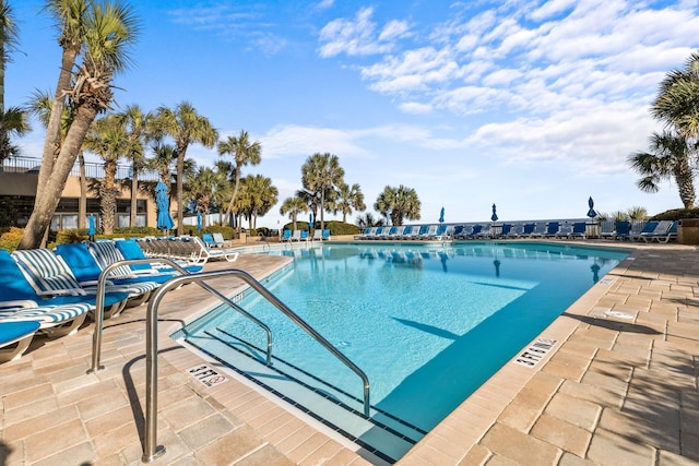 view of pool featuring a patio area