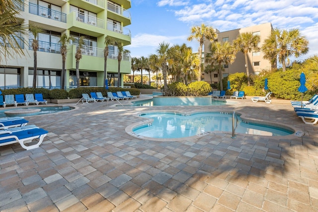 view of pool featuring a patio