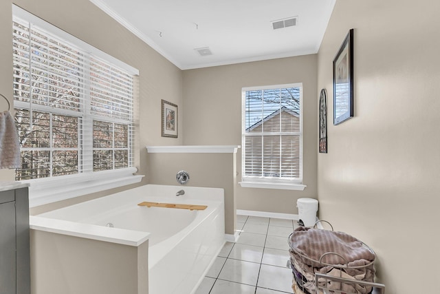 544 Beverly Dr, Summerville, SC 29485 - full bath featuring visible vents, baseboards, ornamental molding, tile patterned floors, and a garden tub