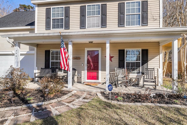 544 Beverly Dr, Summerville, SC 29485 - view of front of house with a garage, a porch, and a shingled roof