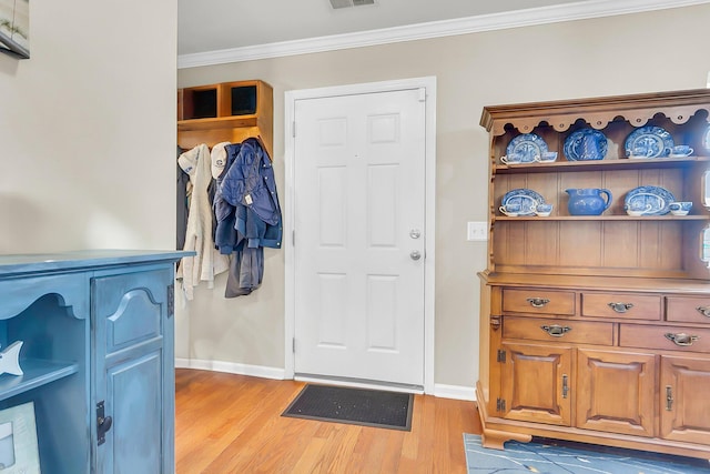 544 Beverly Dr, Summerville, SC 29485 - entrance foyer with light wood-style flooring, baseboards, visible vents, and ornamental molding