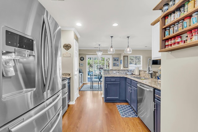 544 Beverly Dr, Summerville, SC 29485 - kitchen with ornamental molding, a peninsula, blue cabinets, appliances with stainless steel finishes, and a sink