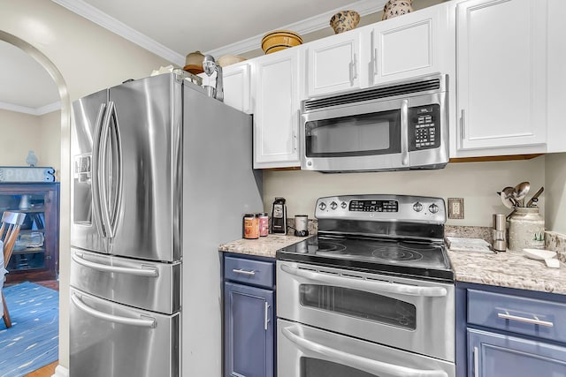 544 Beverly Dr, Summerville, SC 29485 - kitchen with white cabinetry, blue cabinetry, crown molding, and appliances with stainless steel finishes