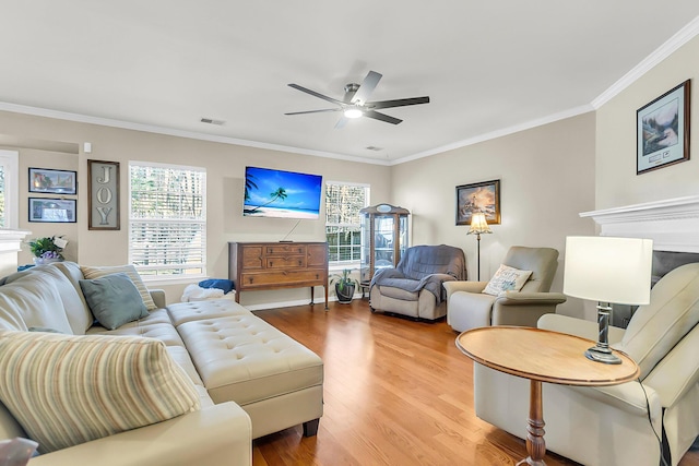 544 Beverly Dr, Summerville, SC 29485 - living room with light wood-style flooring, ornamental molding, and ceiling fan