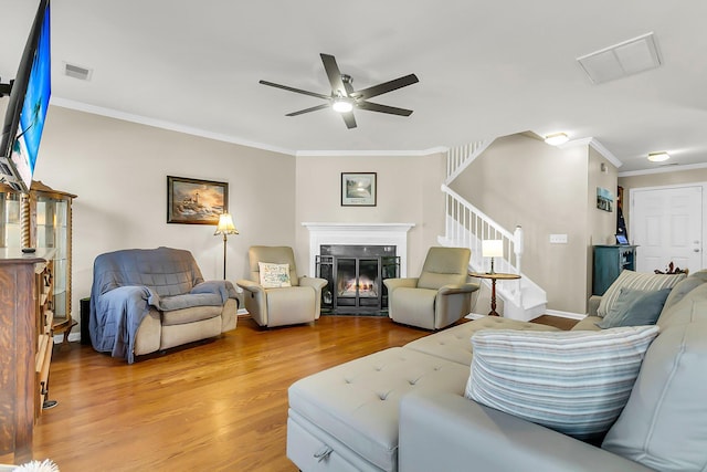 544 Beverly Dr, Summerville, SC 29485 - living area featuring crown molding, wood finished floors, ceiling fan, and visible vents