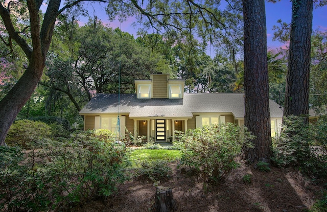 1052 Yorktown Dr, Charleston, SC 29412 - view of front of home featuring a chimney and a shingled roof