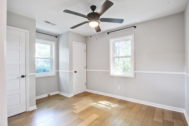 1052 Yorktown Dr, Charleston, SC 29412 - unfurnished bedroom featuring light wood finished floors and a ceiling fan