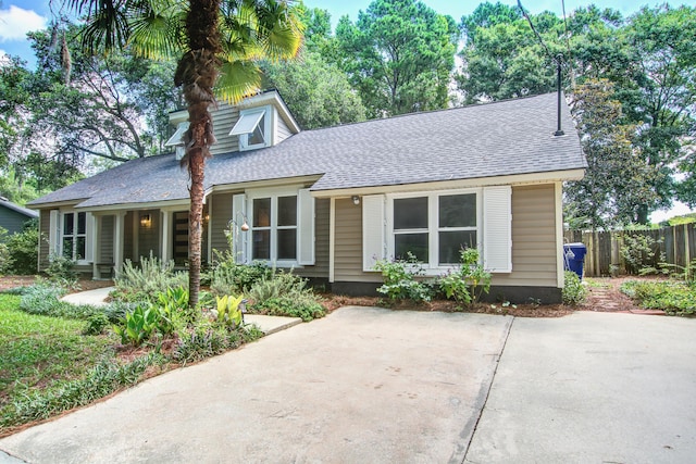 1052 Yorktown Dr, Charleston, SC 29412 - view of front of home with a shingled roof and a patio area